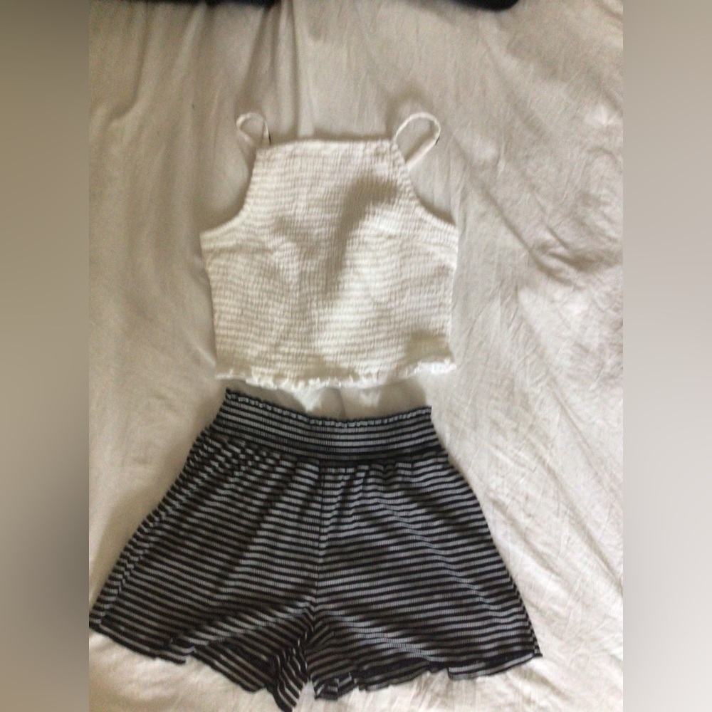 Blue high neck cropped tank with blue and white stripped flowy shorts